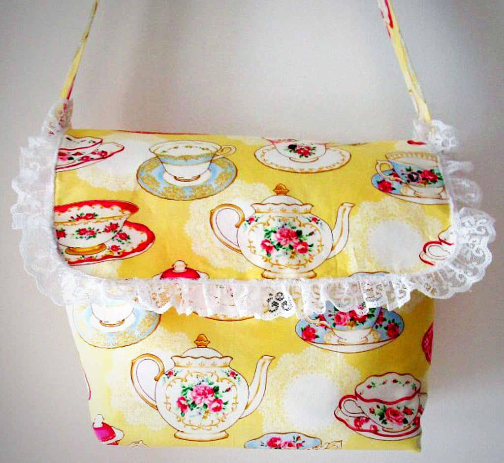 Lace Teacups and Teapots on Yellow Handbag